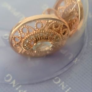 Pair of faux yellow gold earrings.